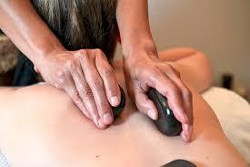 MASSAGE PIERRES CHAUDES
